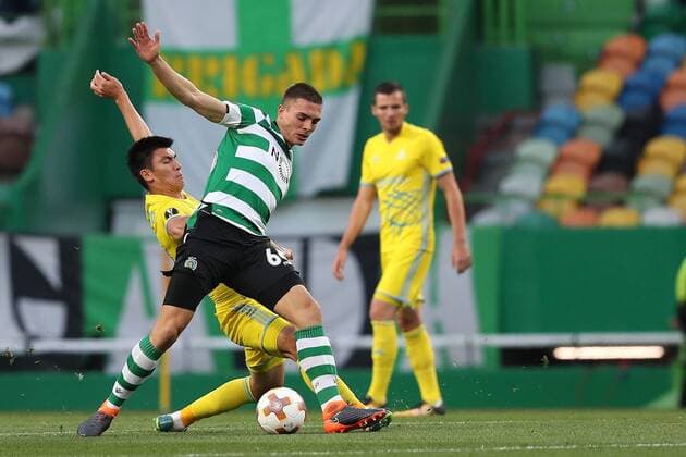 February 22, 2018 - Lisbon, Portugal - Sporting s midfielder Joao Palhinha from Portugal vies with Astanas defender Abzal Beisebekov during the UEFA Europa League round of 32 second leg football match between Sporting CP and FC Astana at Alvalade stadium in Lisbon, Portugal on February 22, 2018. Sporting Lisbon v FC Astana - UEFA Europa League  - ZUMAn230 20180222_zaa_n230_586 Copyright: xPedroxFiuzax