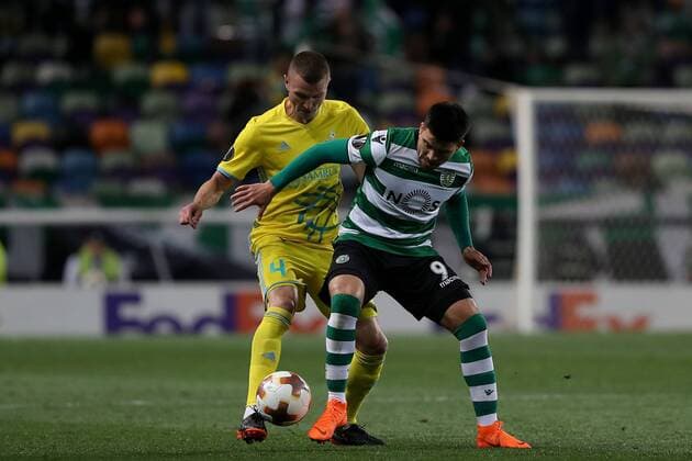 February 22, 2018 - Lisbon, Portugal - Astanas defender Igor Shitov (L) vies with Sporting s midfielder Marcos Acuna from Argentina during the UEFA Europa League round of 32 second leg football match between Sporting CP and FC Astana at Alvalade stadium in Lisbon, Portugal on February 22, 2018. Sporting Lisbon v FC Astana - UEFA Europa League  - ZUMAn230 20180222_zaa_n230_606 Copyright: xPedroxFiuzax