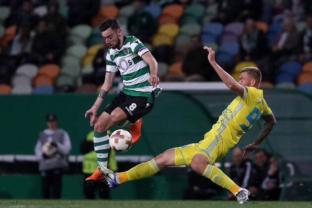 February 22, 2018 - Lisbon, Portugal - Sporting s midfielder Bruno Fernandes from Portugal vies with Astanas midfielder Aleksei Schetkin (R ) during the UEFA Europa League round of 32 second leg football match between Sporting CP and FC Astana at Alvalade stadium in Lisbon, Portugal on February 22, 2018. Sporting Lisbon v FC Astana - UEFA Europa League  - ZUMAn230 20180222_zaa_n230_612 Copyright: xPedroxFiuzax