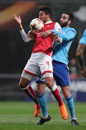 February 22, 2018 - Lisbon, Braga, Portugal - Braga s Egiptian forward Ahmed Hassan with the ball on his chest and Marseille s French defender Adil Rami during the UEFA Europa League, match between SC Braga and Olympique Marseille, at Municipal de Braga Stadium in Braga on February 22, 2018, Portugal. Sporting Braga v Marseille - UEFA Europa League  - ZUMAn230 20180222_zaa_n230_627 Copyright: xDpix