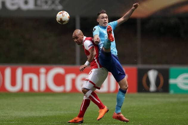 February 22, 2018 - Lisbon, Braga, Portugal - Braga s Portuguese forward Wilson Eduardo (L) vies for the ball with Marseille s Argentinian midfielder Lucas Ocampos during the UEFA Europa League, match between SC Braga and Olympique Marseille, at Municipal de Braga Stadium in Braga on February 22, 2018, Portugal. Sporting Braga v Marseille - UEFA Europa League  - ZUMAn230 20180222_zaa_n230_632 Copyright: xDpix