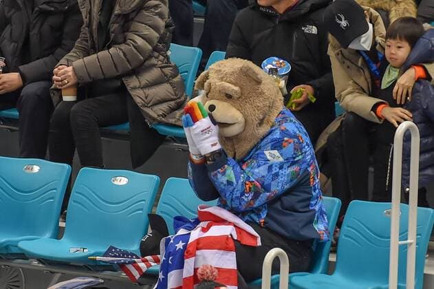 PYEONGCHANG, South Korea - FEBRUARY 22: A Team USA fan dressed in a bear costume prays during the women s gold medal hockey game with the U.S.A. defeating Canada 3-2 in a shootout during the 2018 Winter Olympic Games Olympische Spiele Olympia OS at the Gangneung Hockey Center on February 22, 2018 in PyeongChang, South Korea. (Photo by Ken Murray Icon Sportswire) OLYMPICS: FEB 22 PyeongChang - Day 15 Icon18022215122 EDITORIAL USE ONLY