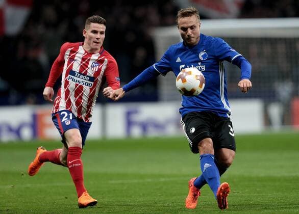 (180223) -- MADRID, Feb. 23, 2018 -- Atletico Madrid s Kevin Gameiro (L) and FC Copenhagen s Pierre Bengtsson vie for the ball during an UEFA Europa League match between Atletico Madrid and FC Copenhagen in Madrid, Spain, on Feb. 22, 2018. Atletico Madrid won 1-0. ) (SP)SPAIN-MADRID-UEFA EUROPA LEAGUE-ATLETICO MADRID VS FC COPENHAGEN JuanxCarlosxRojas 