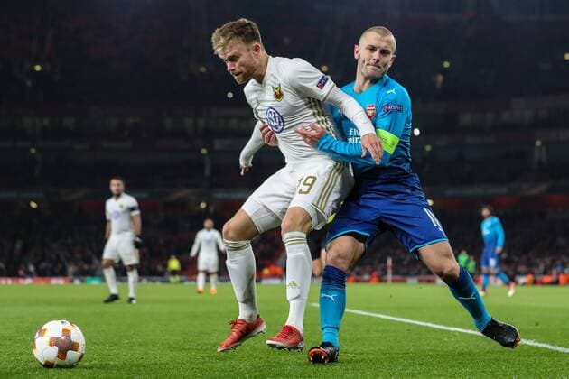 Jack Wilshere of Arsenal (right) and Dennis Widgren of Ostersunds FK battle for the ball during the UEFA Europa League match between Arsenal and Ostersunds FK at the Emirates Stadium, London, England on 22 February 2018. Copyright: xDavidxHornx PMI-1844-0073