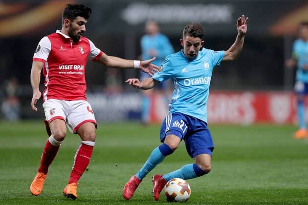 February 22, 2018 - Braga, Braga, Portugal - Braga s Portuguese defender Ricardo Esgaio (L) vibes for the ball with Marseille s French midfielder Maxime Lopez during the UEFA Europa League, match between SC Braga and Olympique Marseille, at Municipal de Braga Stadium in Braga on February 22, 2018, Portugal. Sporting Braga v Marseille - UEFA Europa League  - ZUMAn230 20180222_zaa_n230_1118 Copyright: xDpix