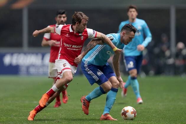 February 22, 2018 - Braga, Braga, Portugal - Braga s Portuguese midfielder Andre Horta ( L ) vies for the ball with Marseille s Argentinian midfielder Lucas Ocampos during the UEFA Europa League, match between SC Braga and Olympique Marseille, at Municipal de Braga Stadium in Braga on February 22, 2018, Portugal. Sporting Braga v Marseille - UEFA Europa League  - ZUMAn230 20180222_zaa_n230_1126 Copyright: xDpix