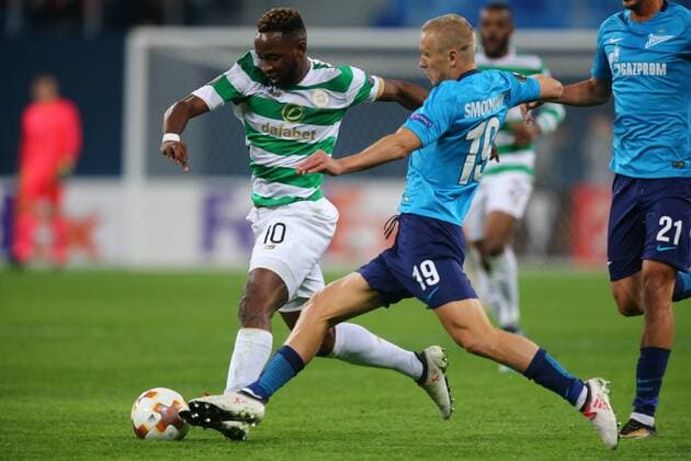 February 22, 2018 - Saint Petersburg, Russia - Moussa Dembele of Celtic (L) and Igor Smolnikov of FC Zenit Saint Petersburg vie for the ball during the UEFA Europa League Round of 32 football match between FC Zenit Saint Petersburg and FK Celtic at Saint Petersburg Stadium. Celtic vs Zenit St Petersburg - UEFA Europa League in Saint Petersburg, Russia - 22 Feb 2018 - ZUMAs197 82004176st Copyright: xIgorxRussakx xSopaxImagesx