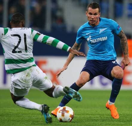 February 22, 2018 - Saint Petersburg, Russia - Olivier Ntcham of Celtic (L) and Anton Zabolotny of FC Zenit Saint Petersburg vie for the ball during the UEFA Europa League Round of 32 football match between FC Zenit Saint Petersburg and FK Celtic at Saint Petersburg Stadium. Celtic vs Zenit St Petersburg - UEFA Europa League in Saint Petersburg, Russia - 22 Feb 2018 - ZUMAs197 82004236st Copyright: xIgorxRussakx xSopaxImagesx