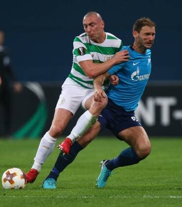 February 22, 2018 - Saint Petersburg, Russia - Scott Brown of Celtic (L) and Branislav Ivanovic of FC Zenit Saint Petersburg vie for the ball during the UEFA Europa League Round of 32 football match between FC Zenit Saint Petersburg and FK Celtic at Saint Petersburg Stadium. Celtic vs Zenit St Petersburg - UEFA Europa League in Saint Petersburg, Russia - 22 Feb 2018 - ZUMAs197 82004241st Copyright: xIgorxRussakx xSopaxImagesx