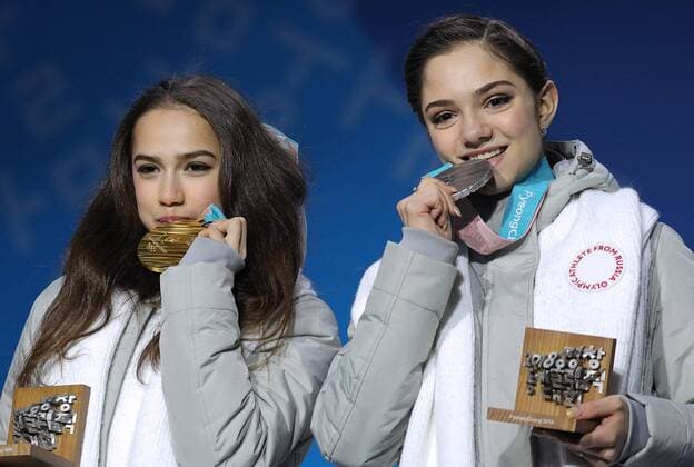 PYEONGCHANG, SOUTH KOREA â€“ FEBRUARY 23, 2018: Olympic Athletes from Russia, gold medallist Alina Zagitova (L) and silver medallist Evgenia Medvedeva at a victory ceremony for the ladies Figure skating Eiskunstlauf event at the 2018 Winter Olympic Games Olympische Spiele Olympia OS Sergei Bobylev TASS  TS075709