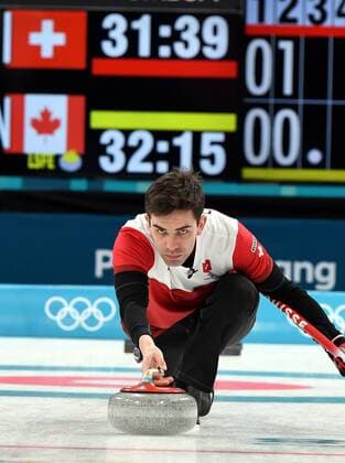 (180223) -- PYEONGCHANG, Feb. 23, 2018 -- Switzerland s Peter De Cruz competes during bronze medal game of men s curling against Canada at 2018 PyeongChang Winter Olympic Games Olympische Spiele Olympia OS at Gangneung Curling Centre, Gangneung, South Korea, Feb. 23, 2018. Switzerland won 7:5 and claimed bronze medal. ) (SP)OLY-SOUTH KOREA-PYEONGCHANG-CURLING-MEN-BRONZE MEDAL GAME-SUI VS CAN MaxPing 