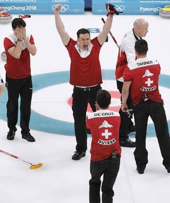 Pyeongchang Olympics Members of the Swiss men s curling team celebrate after defeating Canada 7-5 in the bronze medal game at the Pyeongchang Winter Olympics in Gangneung, South Korea, on Feb. 23, 2018. 