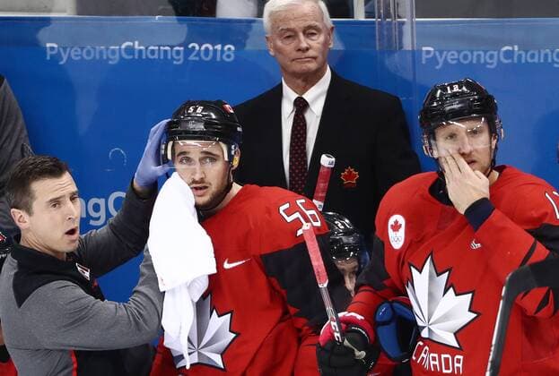 GANGNEUNG, SOUTH KOREA â€“ FEBRUARY 23, 2018: Canada s forward Rob Klinkhammer, assistant coach Dave King, and defenceman Maxim Noreau (R-L) in their men s semifinal Ice hockey Eishockey match against Germany during the 2018 Winter Olympic Games Olympische Spiele Olympia OS at the Gangneung Hockey Centre. Valery Sharifulin TASS  TS075755