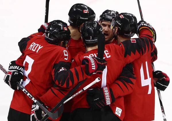 GANGNEUNG, SOUTH KOREA â€“ FEBRUARY 23, 2018: Canada s players celebrate scoring in their men s semifinal Ice hockey Eishockey match against Germany during the 2018 Winter Olympic Games Olympische Spiele Olympia OS at the Gangneung Hockey Centre. Valery Sharifulin TASS  TS075799