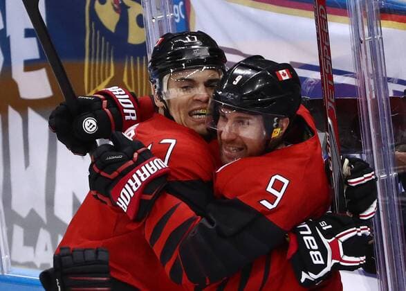 GANGNEUNG, SOUTH KOREA â€“ FEBRUARY 23, 2018: Canada s Rene Bourque (L) and Derek Roy celebrate scoring in their men s semifinal Ice hockey Eishockey match against Germany during the 2018 Winter Olympic Games Olympische Spiele Olympia OS at the Gangneung Hockey Centre. Valery Sharifulin TASS  TS0757B2