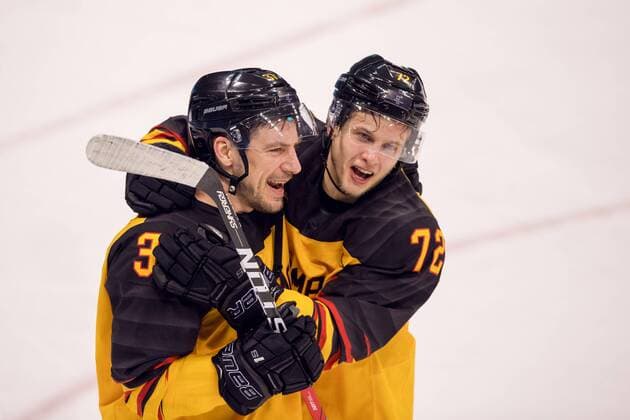 180223 Patrick Reimer of Germany and Dominick Kahun of Germany celebrates in the Mens ice hockey semifinal between Canada and Germany during day fourteen of the 2018 Winter Olympics on February 23, 2018 in Pyeongchang Photo Petter Arvidson BILDBYRAN Code PA 91999  Copyright: PETTERxARVIDSON BB180223PA108