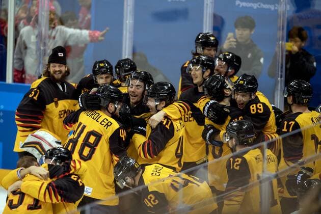 180223 The German team celebrates after the Mens ice hockey semifinal between Canada and Germany during day fourteen of the 2018 Winter Olympics on February 23, 2018 in Pyeongchang Photo Petter Arvidson BILDBYRAN Code PA 91999  Copyright: PETTERxARVIDSON BB180223PA120