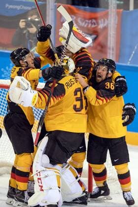 180223 The German team celebrates after the Mens ice hockey semifinal between Canada and Germany during day fourteen of the 2018 Winter Olympics on February 23, 2018 in Pyeongchang Photo Petter Arvidson BILDBYRAN Code PA 91999  Copyright: PETTERxARVIDSON BB180223PA121