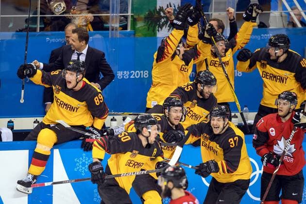 180223 The German players celebrate after the Mens ice hockey semifinal between Canada and Germany during day fourteen of the 2018 Winter Olympics on February 23, 2018 in Pyeongchang Photo Petter Arvidson BILDBYRAN Code PA 91999  Copyright: PETTERxARVIDSON BB180223PA124