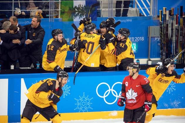 180223 The German players celebrate after the Mens ice hockey semifinal between Canada and Germany during day fourteen of the 2018 Winter Olympics on February 23, 2018 in Pyeongchang Photo Petter Arvidson BILDBYRAN Code PA 91999  Copyright: PETTERxARVIDSON BB180223PA125