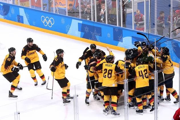 GANGNEUNG, SOUTH KOREA â€“ FEBRUARY 23, 2018: Germany s players celebrate winning their men s semifinal Ice hockey Eishockey match against Canada during the 2018 Winter Olympic Games Olympische Spiele Olympia OS at the Gangneung Hockey Centre. Team Germany won the game 4-3 and propelled to the final. Valery Sharifulin TASS  TS0757B9