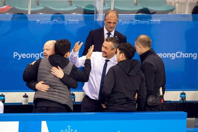 180223 The German coach team celebrates after the Mens ice hockey semifinal between Canada and Germany during day fourteen of the 2018 Winter Olympics on February 23, 2018 in Pyeongchang Photo Petter Arvidson BILDBYRAN Code PA 91999  Copyright: PETTERxARVIDSON BB180223PA131