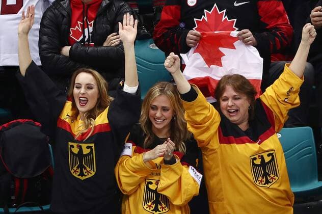 GANGNEUNG, SOUTH KOREA â€“ FEBRUARY 23, 2018: Germany s fans celebrate winning their men s semifinal Ice hockey Eishockey match against Canada during the 2018 Winter Olympic Games Olympische Spiele Olympia OS at the Gangneung Hockey Centre. Team Germany won the game 4-3 and propelled to the final. Valery Sharifulin TASS  TS0757BD