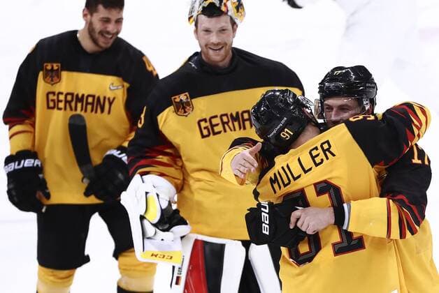 GANGNEUNG, SOUTH KOREA â€“ FEBRUARY 23, 2018: Germany s players celebrate winning their men s semifinal Ice hockey Eishockey match against Canada during the 2018 Winter Olympic Games Olympische Spiele Olympia OS at the Gangneung Hockey Centre. Team Germany won the game 4-3 and propelled to the final. Valery Sharifulin TASS  TS0757BF
