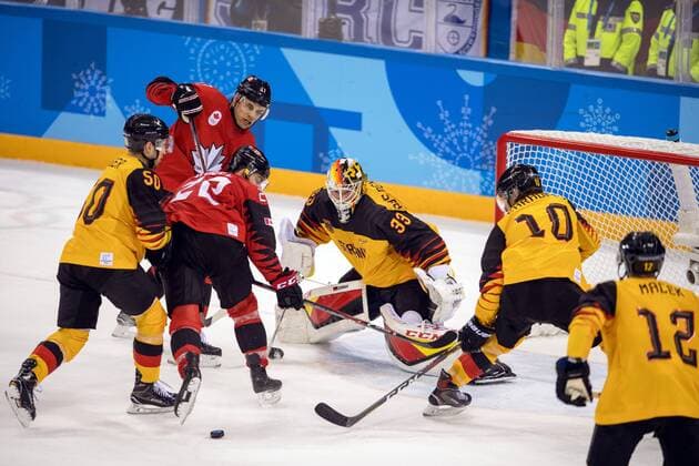 180223 Eric O Dell or Canada in front of goalkeeper Danny aus den Birken of Germany in the Mens ice hockey semifinal between Canada and Germany during day fourteen of the 2018 Winter Olympics on February 23, 2018 in Pyeongchang Photo Petter Arvidson BILDBYRAN Code PA 91999  Copyright: PETTERxARVIDSON BB180223PA138
