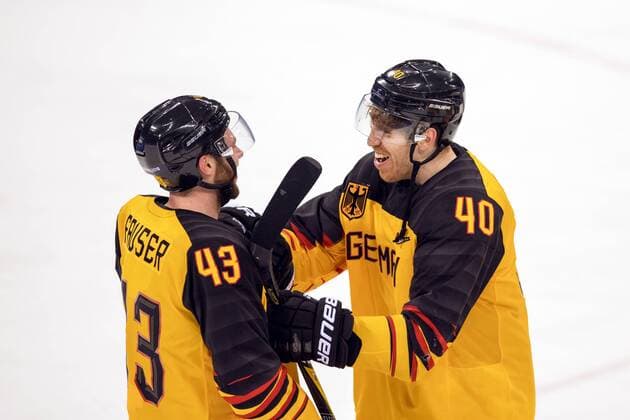180223 Gerrit Fauser and Björn Krupp of Germany celebrate after the Mens ice hockey semifinal between Canada and Germany during day fourteen of the 2018 Winter Olympics on February 23, 2018 in Pyeongchang Photo Petter Arvidson BILDBYRAN Code PA 91999  Copyright: PETTERxARVIDSON BB180223PA140