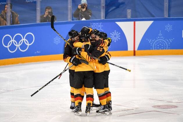 (180223) -- PYEONGCHANG, Feb. 23, 2018 -- Team members of Germany celebrate victory after a men s semi-final game of Ice hockey Eishockey against Canada at the 2018 PyeongChang Winter Olympic Games Olympische Spiele Olympia OS at Gangneung Ice Hockey Centre, Gangnueng, South Korea, Feb. 23, 2018. Germany won 4:3 and advanced to final game. ) (SP)OLY-SOUTH KOREA-PYEONGCHANG-ICE HOCKEY-MEN S SEMI-FINAL-GER VS CAN WangxSong 