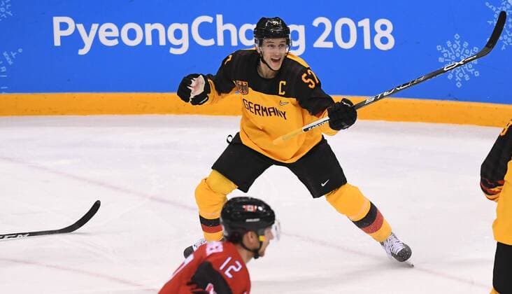 (180223) -- PYEONGCHANG, Feb. 23, 2018 -- Marcel Goc (top) of Germany celebrates a goal in a men s semi-final game of Ice hockey Eishockey against Canada at the 2018 PyeongChang Winter Olympic Games Olympische Spiele Olympia OS at Gangneung Ice Hockey Centre, Gangnueng, South Korea, Feb. 23, 2018. Germany won 4:3 and advanced to final game. ) (SP)OLY-SOUTH KOREA-PYEONGCHANG-ICE HOCKEY-MEN S SEMI-FINAL-GER VS CAN WangxHaofei 