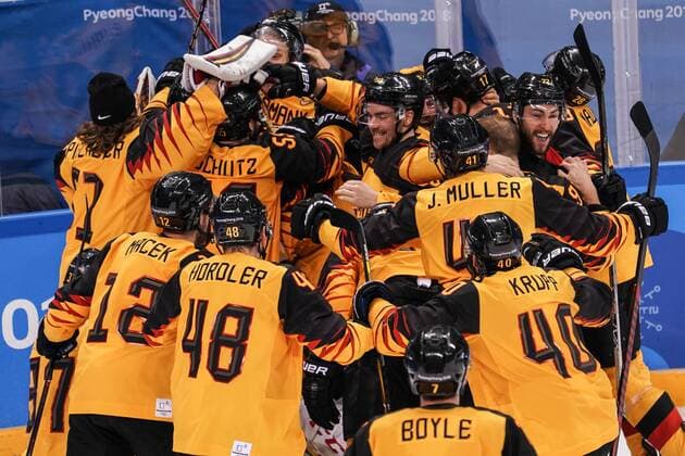 (180223) -- PYEONGCHANG, Feb. 23, 2018 -- Team members of Germany celebrate victory after a men s semi-final game of Ice hockey Eishockey against Canada at the 2018 PyeongChang Winter Olympic Games Olympische Spiele Olympia OS at Gangneung Ice Hockey Centre, Gangnueng, South Korea, Feb. 23, 2018. Germany won 4:3 and advanced to final game. ) (SP)OLY-SOUTH KOREA-PYEONGCHANG-ICE HOCKEY-MEN S SEMI-FINAL-GER VS CAN WuxZhuang 