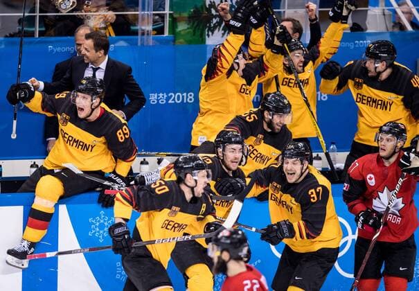 180223 Team Germany celebrates and Mat Robinson of Canada looks dejected after in the Mens Ice Hockey semifinal between Canada and Germany during day fourteen of the 2018 Winter Olympics on February 23, 2018 in Pyeongchang Photo Petter Arvidson BILDBYRAN Code PA 92000  Copyright: PETTERxARVIDSON BB180223PA154