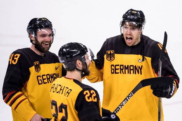 180223 Björn Krupp Gerrit Fauser and Matthias Plachta of Germany celebrates after the Ice Hockey semifinal between Canada and Germany during day fourteen of the 2018 Winter Olympics on February 23, 2018 in Pyeongchang Photo Petter Arvidson BILDBYRAN Code PA 92000  Copyright: PETTERxARVIDSON BB180223PA167