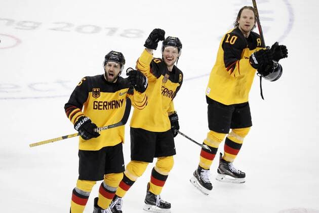 PROTECTION Felix with HAGER Patrick and EHRHOFF Christian Team Germany Final victory after the victory Ice Hockey Semi-final Canada Germany 3 4 Olympic Wintergames 2018 Pyeongchang South Korea 2018 Olympic Winter Games Pyeongchang 23 February 2018