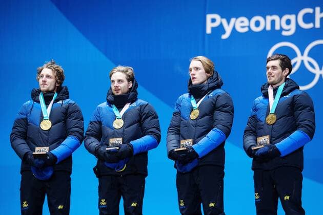 180224 Peppe Femling Jesper Nelin Sebastian Samuelsson and Fredrik Lindström of Sweden Gold celebrates at the Medal Ceremony for the Mens Biathlon 4x7 5 km relay during day fifteen of the 2018 Winter Olympics on February 24, 2018 in Pyeongchang Photo Carl Sandin BILDBYRAN Code CS 57999 322  Copyright: CARLxSANDIN BB180224CS097