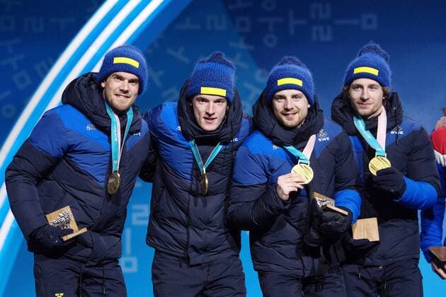 180224 Peppe Femling Jesper Nelin Sebastian Samuelsson and Fredrik Lindström of Sweden Gold celebrating at the Medal Ceremony for the Mens Biathlon 4x7 5 km relay during day fifteen of the 2018 Winter Olympics on February 24, 2018 in Pyeongchang Photo Carl Sandin BILDBYRAN Code CS 57999 322  Copyright: CARLxSANDIN BB180224CS122