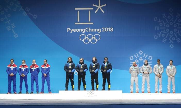 (180224) -- PYEONGCHANG, Feb. 24, 2018 -- Champion team Sweden (C), second-placed team Norway (L) and third-placed team Germany pose for photos during medal ceremony of men s 4x7.5km relay of biathlon at the 2018 PyeongChang Winter Olympic Games Olympische Spiele Olympia OS at Medal Plaza, PyeongChang, South Korea, Feb. 24, 2018. ) (SP)OLY-SOUTH KOREA-PYEONGCHANG-BIATHLON-MEN S 4X7.5KM RELAY-MEDAL CEREMONY LixGang 