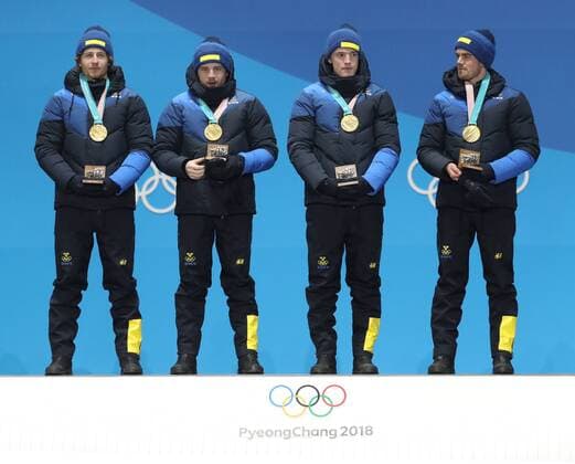 (180224) -- PYEONGCHANG, Feb. 24, 2018 -- Champion team Sweden pose for photos during medal ceremony of men s 4x7.5km relay of biathlon at the 2018 PyeongChang Winter Olympic Games Olympische Spiele Olympia OS at Medal Plaza, PyeongChang, South Korea, Feb. 24, 2018. ) (SP)OLY-SOUTH KOREA-PYEONGCHANG-BIATHLON-MEN S 4X7.5KM RELAY-MEDAL CEREMONY LixGang 
