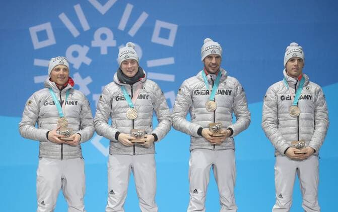 (180224) -- PYEONGCHANG, Feb. 24, 2018 -- Third-placed team Germany pose for photos during medal ceremony of men s 4x7.5km relay of biathlon at the 2018 PyeongChang Winter Olympic Games Olympische Spiele Olympia OS at Medal Plaza, PyeongChang, South Korea, Feb. 24, 2018. ) (SP)OLY-SOUTH KOREA-PYEONGCHANG-BIATHLON-MEN S 4X7.5KM RELAY-MEDAL CEREMONY LixGang 
