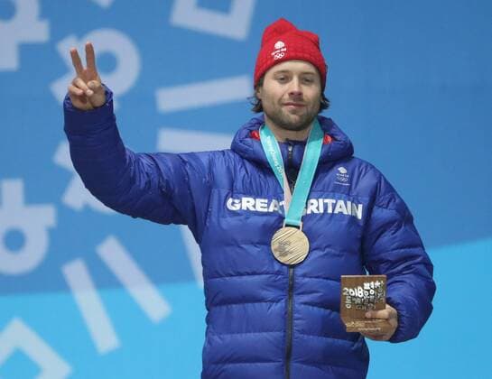 (180224) -- PYEONGCHANG, Feb. 24, 2018 -- Bronze medalist Billy Morgan of Britain poses for photos during medal ceremony of men s big air of snowboard at the 2018 PyeongChang Winter Olympic Games Olympische Spiele Olympia OS at Medal Plaza, PyeongChang, South Korea, Feb. 24, 2018. ) (SP)OLY-SOUTH KOREA-PYEONGCHANG-SNOWBOARD-MEN S BIG AIR-MEDAL CEREMONY LixGang 