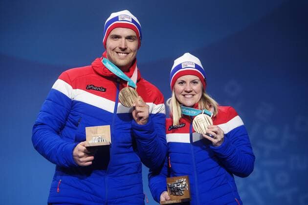 180224 Kristin Moen Skaslien and Magnus Nedregotten of Norway awarded a bronze after a russian athlete was disqualified celebrate at the Medal Ceremony for the Mixed Double Curling Event during day fifteen of the 2018 Winter Olympics on February 24, 2018 in Pyeongchang Photo Carl Sandin BILDBYRAN Code CS 57999 322  Copyright: CARLxSANDIN BB180224CS143