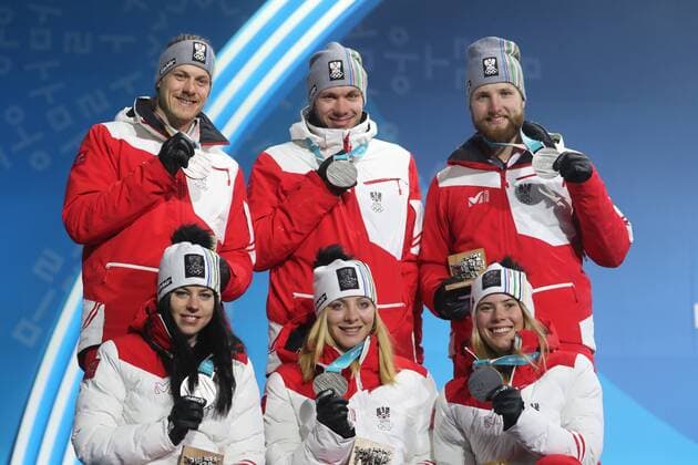 OLYMPICS - 2018 Winter Olympics PYEONGCHANG,SOUTH KOREA,24.FEB.18 - OLYMPICS, ALPINE SKIING - Olympic Winter games Winterspiele Spiele Summer games PyeongChang 2018, Medals Plaza, award ceremony, mixed team competition. Image shows Manuel Feller, Michael Matt, Marco Schwarz, Stephanie Brunner, Katharina Gallhuber and Katharina Liensberger (AUT). Keywords: medal. GEPAxpictures xMathiasxMandl