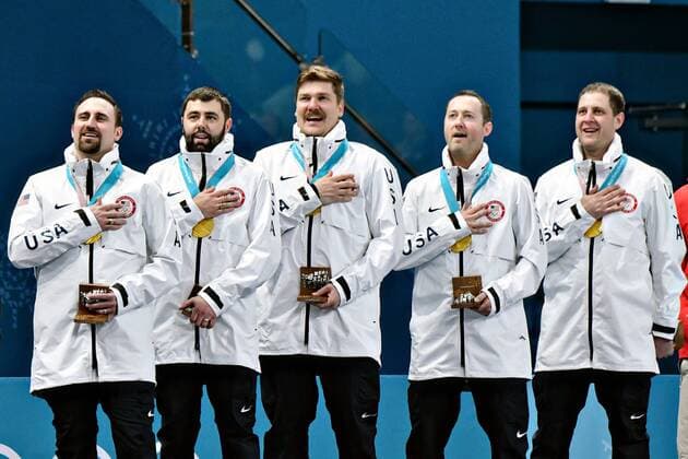 The United States Men s curling team stands for the national anthem during the medal ceremony for Men s Curling at the Pyeongchang 2018 Winter Olympics, in the Gangneung Curling Centre in Gangneung, South Korea, on February 24, 2018. The USA won the gold medal for the first time beating Sweden who took the silver.  OLY20180224501 RICHARDxELLIS