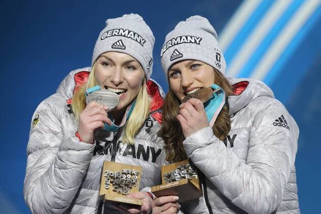 OLYMPICS - 2018 Winter Olympics PYEONGCHANG,SOUTH KOREA,24.FEB.18 - OLYMPICS, SNOWBOARDING - Olympic Winter games Winterspiele Spiele Summer games PyeongChang 2018, Medals Plaza, award ceremony, parallel giant slalom, ladies. Image shows Selina Joerg and Ramona Hofmeister (GER). Keywords: medal. GEPAxpictures xMathiasxMandl