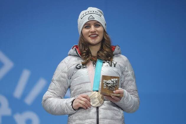OLYMPICS - 2018 Winter Olympics PYEONGCHANG,SOUTH KOREA,24.FEB.18 - OLYMPICS, SNOWBOARDING - Olympic Winter games Winterspiele Spiele Summer games PyeongChang 2018, Medals Plaza, award ceremony, parallel giant slalom, ladies. Image shows Ramona Hofmeister (GER). Keywords: medal. GEPAxpictures xMathiasxMandl