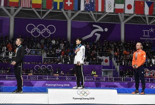 Belgian silver medalist Bart Swings, South Korean gold medalist Seung-Hoon Lee and Dutch bronze medalist Koen Verweij pictured on the podium during the medal ceremony after the men s mass start Speed skating Eisschnelllauf event at the XXIII Olympic Winter games Winterspiele Spiele Summer games Saturday 24 February 2018, in Pyeongchang, South Korea. The Winter Olympics are taking place from 9 February to 25 February in Pyeongchang County, South Korea. DIRKxWAEM  x05301940x