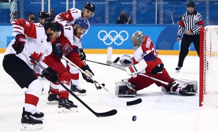 GANGNEUNG, SOUTH KOREA - FEBRUARY 24, 2018: Canada s Derek Roy, the Czech Republic s Michal Jordan, Canada s Rene Bourque, and the Czech Republic s goalie Pavel Francouz (L-R) in action in the men s bronze medal Ice hockey Eishockey game between the Czech Republic and Canada at Gangneug Hockey Centre at the 2018 Winter Olympic Games Olympische Spiele Olympia OS Valery Sharifulin TASS  TS075971
