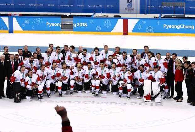 GANGNEUNG, SOUTH KOREA - FEBRUARY 24, 2018: Canada s players pose for a group photo with their medals after winning the men s bronze medal Ice hockey Eishockey game between the Czech Republic and Canada at Gangneug Hockey Centre at the 2018 Winter Olympic Games Olympische Spiele Olympia OS Canada won the game 6-4. Valery Sharifulin TASS  TS075990